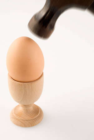 Hammer used to smash boiled eggの写真素材