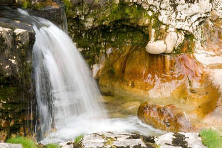 Close up of water fall showing rock erosionの写真素材