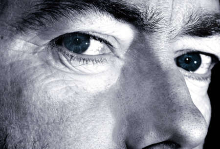 Black and white close-up of man's eyes