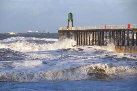Stormy seas off Whitby, North Yorkshire, England, UKの写真素材