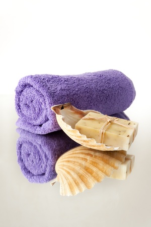 Towel and Raw Natural Soap in Seashellの写真素材