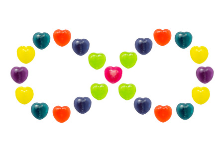 Heart shape confectionery is set in infinity style on white backgroundの写真素材