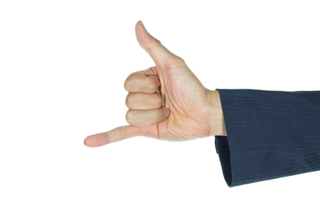 Horn sign of businessman on white background. Businessman show thumb and little finger. Horn symbol hand shape.の写真素材