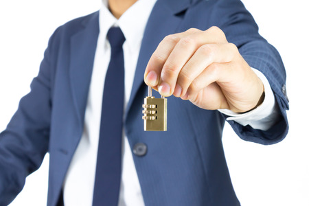 Businessman and Combination Lock on Blue Suit Style. Concept About Security in Company or...