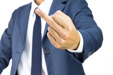 Businessman in Blue Suit Show Middle Finger or Fuck You Sign Isolated on White Background. Concept About Angry or Furiousの写真素材