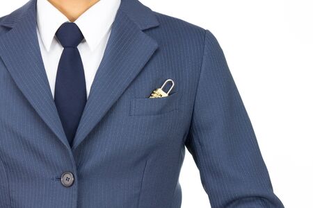 Businessman in Blue Suit With Combination Lock in Pocket Isolated on White Background. Concept about Security or Safety.の写真素材