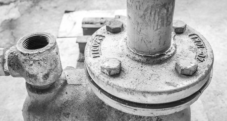 The Piping of Industrial Water Pump. Old water pump with rust bolt. Heavy duty water pump for industryの写真素材