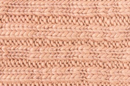 Brown Knitting Texture or Knitted Texture Background in macro style. Knitting Texture or Knitted...