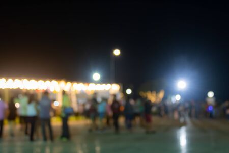 Blurred Lights and Blurred People in Loi Krathong Festival at Phayao Thailand in Medium Shotの写真素材