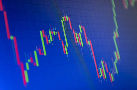Tilted Red and Green Stock Chart or Forex Chart and Table Line on Blue Backgroundの写真素材