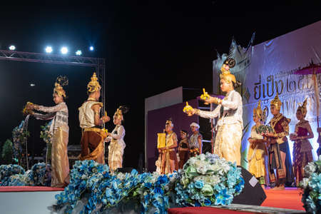 Phayao, Thailand - November 10 2019: Group of Thai Girls and Boys Actor in Traditional Dress or National Costume Dancing on Stage in Loi Krathong Festival at Phayao Thailandのeditorial素材