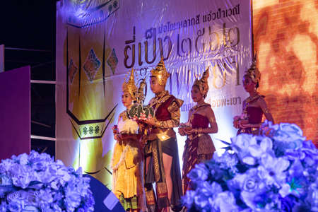 Phayao, Thailand - November 10 2019: 3 Thai Women in Traditional Dress or National Costume on Stage in Loi Krathong Festival at Phayao Thailandのeditorial素材