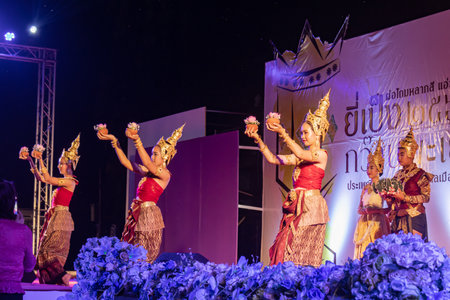 Phayao, Thailand - November 10 2019: 3 Thai Women in Traditional Dress or National Costume Dancing on Stage in Loi Krathong Festival at Phayao Thailandのeditorial素材