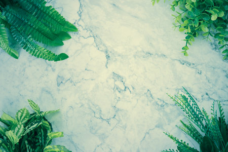 Modern Clean Flat Lay or Top View Office Desk or Office Table and Office Plants or Tree at Corner on Marble Minimalist Background in Vintage Toneの写真素材