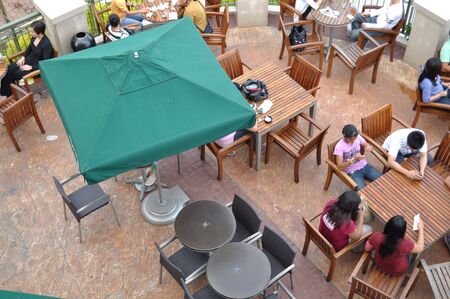 Tagaytay City, Philippines, September 4, 2010: Customers drinking their coffee at the Starbucksのeditorial素材