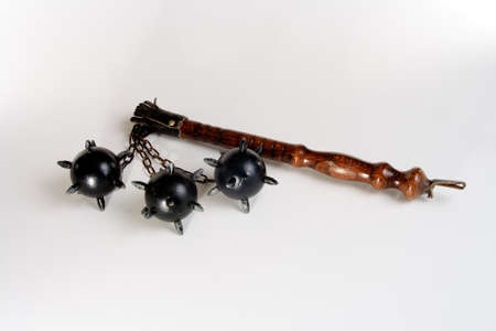 Triple balls medieval mace on white backgroundの写真素材
