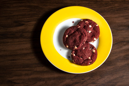 Red Velvet cookie with white chocolate. Top view.