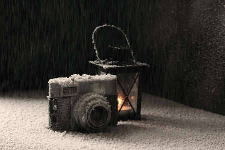 Old camera even under the heavy snowing.の写真素材