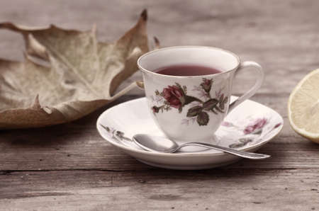 Tee stylish in an old cup. I use filterto give more romantic feelings to the photo.の写真素材