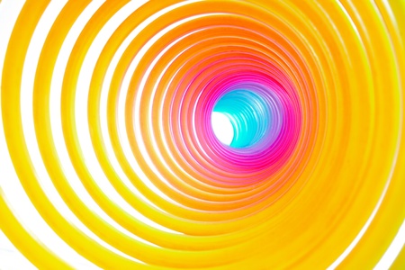 A macro photo inside from a old fashioned toy, a colorful spiral,の写真素材