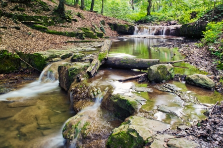 This mini waterfall was photographed in a place named Obanya  It is a nature reserve in Hungary, the county of Baranya, Mecsek mountain の写真素材