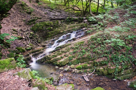 This mini waterfall was photographed in a place named Obanya  It is a nature reserve in Hungary, the county of Baranya, Mecsek mountain の写真素材