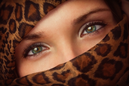 Young women cover her face with a headscarfの写真素材