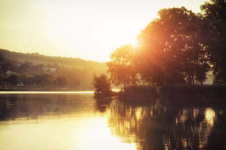 Beautiful sunset over the lakeの写真素材