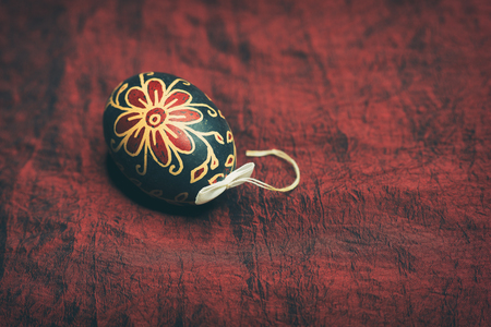 Vintage style photo from Easter egg decorated with traditional hungarian patternの写真素材