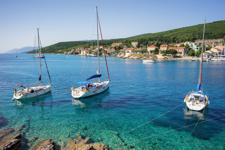 Boats in the port of Fiscardo in Kefalonia, Ionian Islands, Greeceの写真素材