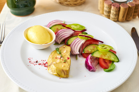 Duck liver with vegetablesの写真素材