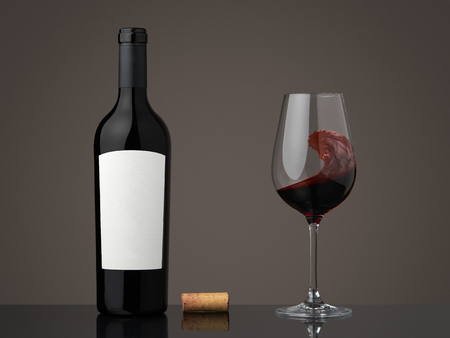 Wine bottle with wineglass. Red wine in a glassの写真素材
