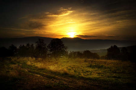 Sunrise fron the Tarcu Mountain (Romania)の写真素材