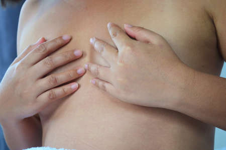 Healthy concept, breast cancer self check.の写真素材