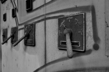 Old lever on a junction boxの写真素材