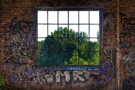 Windows of metal in an abandoned hall