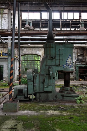 Old machine for punching metal in a production hallのeditorial素材