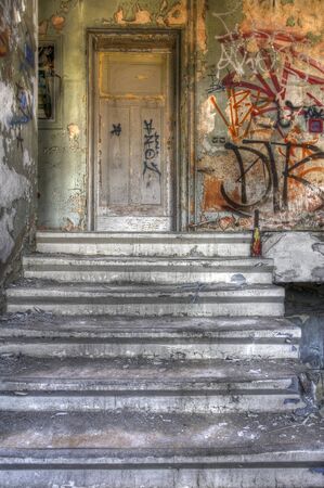 Stairs to a hospital room with an old doorのeditorial素材