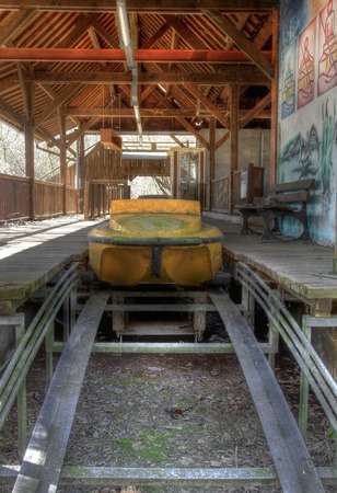 Departure station for the log flume at an abandoned amusement parkのeditorial素材