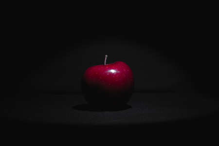 Apple fruit, abstract shadow, black background, red appleの写真素材