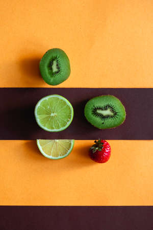 Different fruits on colorful abstract background, diversityの写真素材