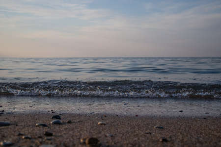 Waves seaside, clear blue water