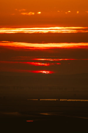 Sunset and beautiful light, sunlight illuminating the colorful sky, clouds, beautiful nature