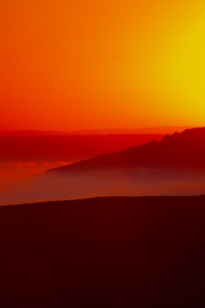 Sunrise landscape, colorful warm cold nature, world, river, hills and village, sunlightの写真素材