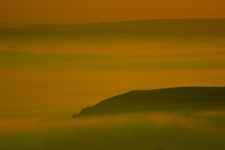 Sunrise landscape, colorful warm cold nature, world, river, hills and village, sunlightの写真素材