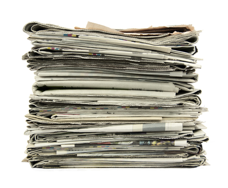 Stack of newspapers isolated on white background