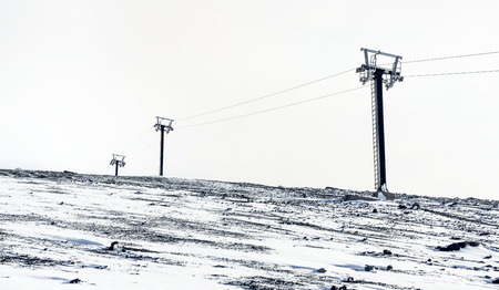 Ski lift towers on Etna mountainの写真素材