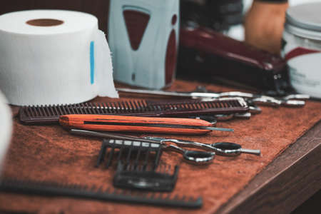 Barber shop tools on old wooden background.の写真素材