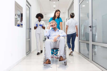 First Floor of the Busy Hospital, Doctors, Nurses and Personnel Busy Working, Assistant Moves...