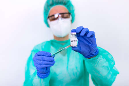 Doctor or nurse hand with nitrile glove holding flu